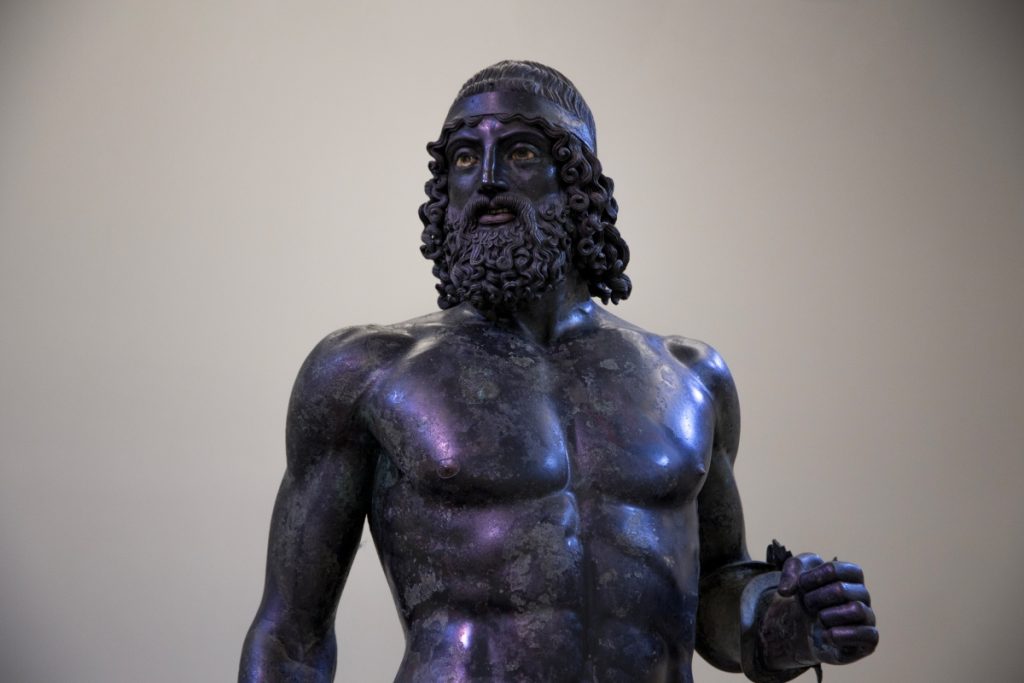 Among the best places in Calabria is Reggio Calabria where a Riace Bronze statue showcasing the detailed features of the ancient Greek warrior can be found.