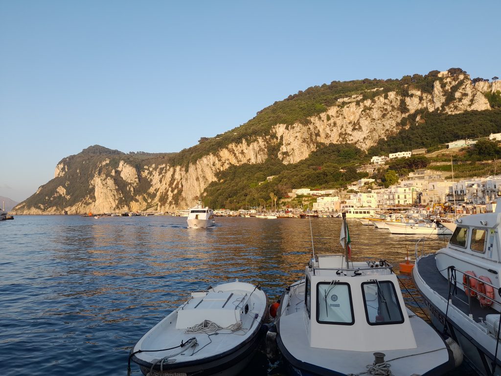 Stunning view of Capri Island with its rocky cliffs and crystal-clear waters.