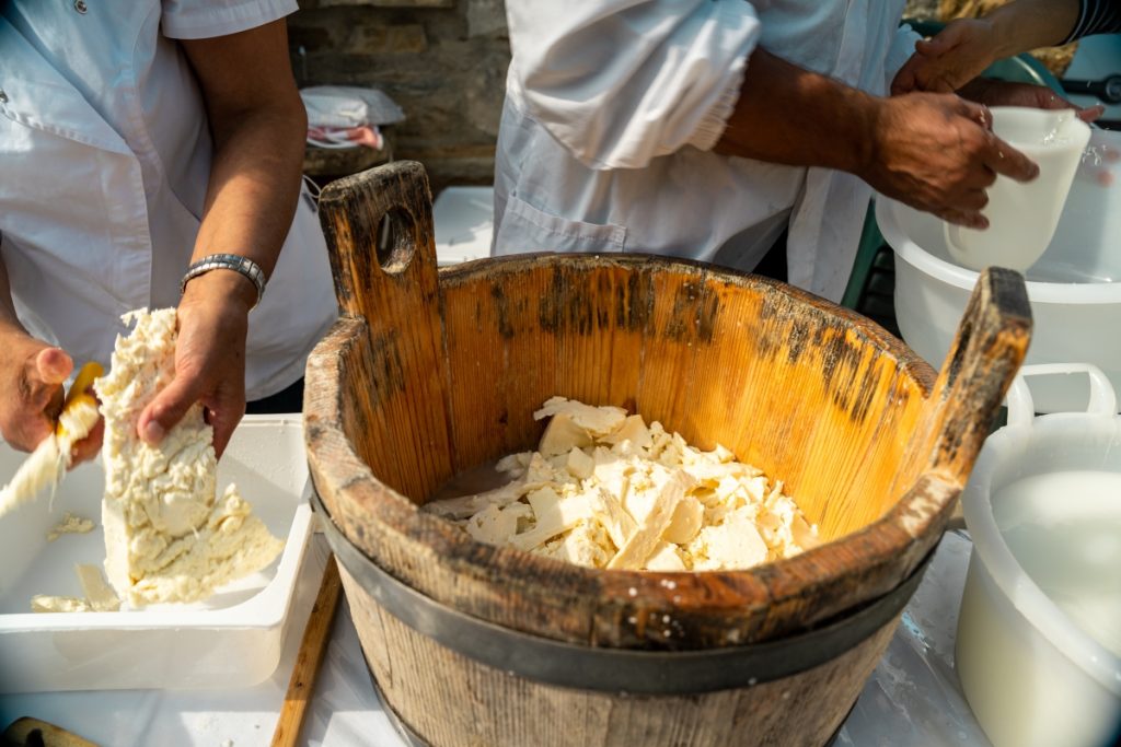 Artisanal cheese production process in Italy.