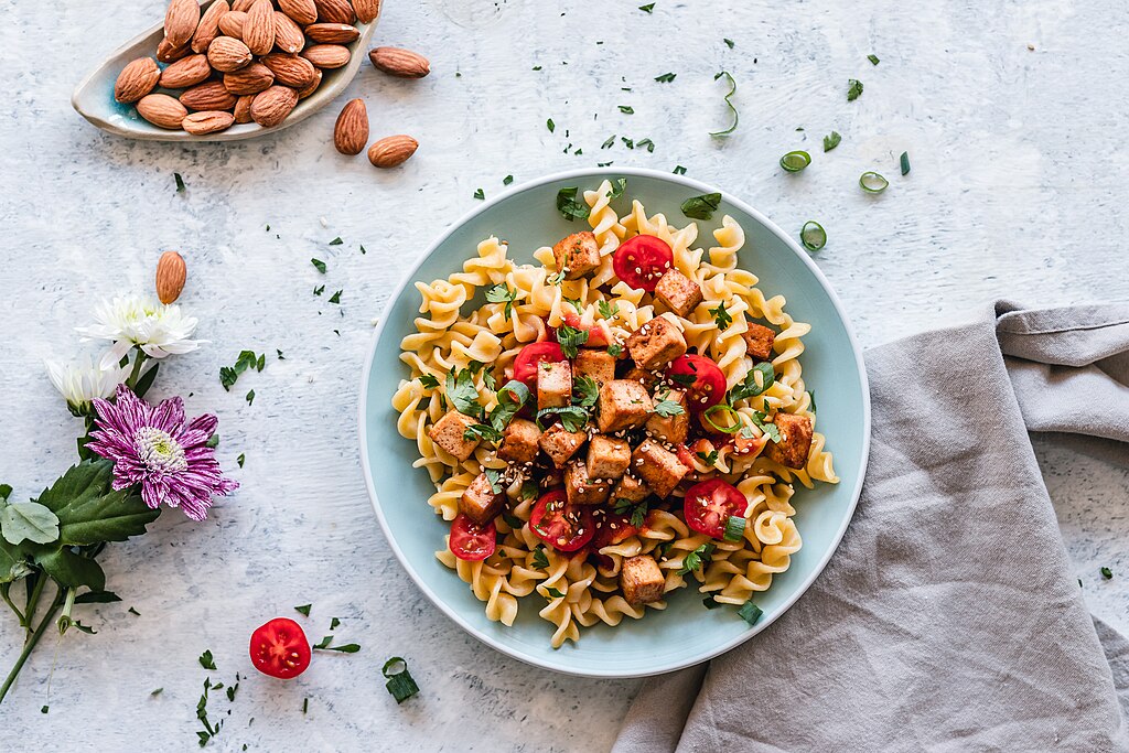 A pasta tofu dish demonstrating Italian pasta shapes guide for vegetarian meals