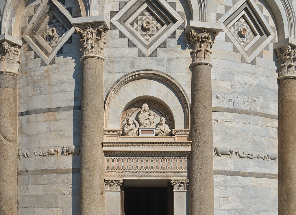 Detail of the west side of the Leaning Tower of Pisa, highlighting Romanesque arches and marble columns