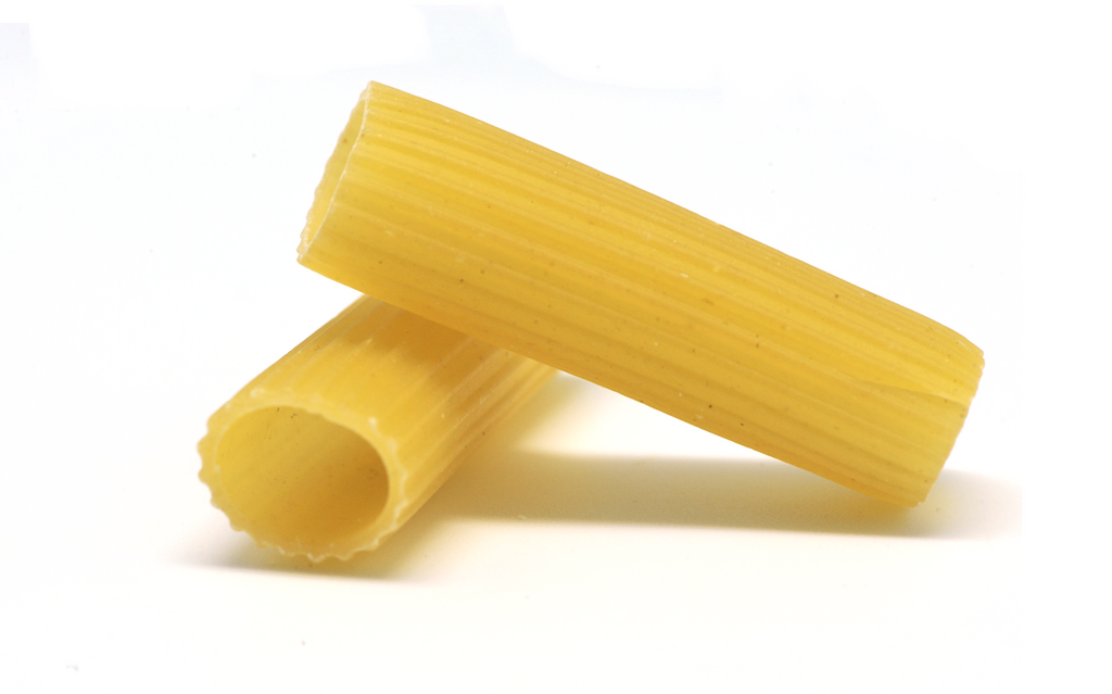 Rigatoni pasta closeup on a white background